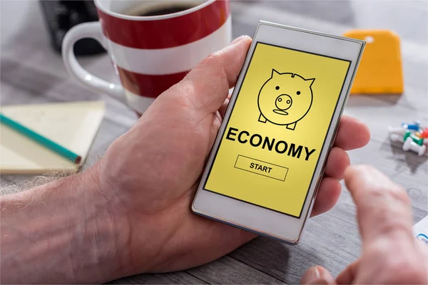 Economy concept on a smartphone — Stock Photo, Image