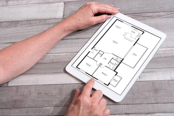 Apartamento plano conceito em um tablet — Fotografia de Stock