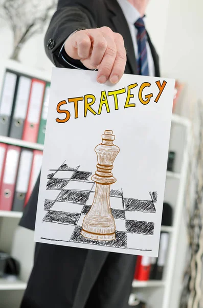 Strategy concept shown by a businessman — Stock Photo, Image