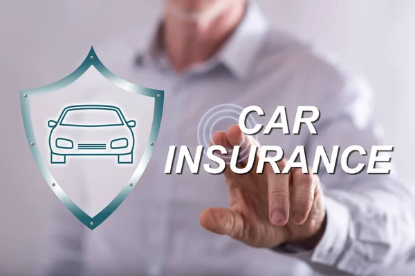 Man touching a car insurance concept on a touch screen — Stock Photo, Image