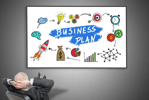 Бізнесмен дивиться на концепцію бізнес-плану — стокове фото
