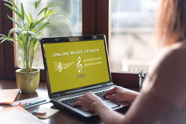 Online music lesson concept on a laptop screen