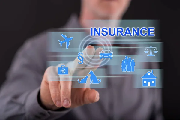 Man touching an insurance concept on a touch screen — Stock Photo, Image