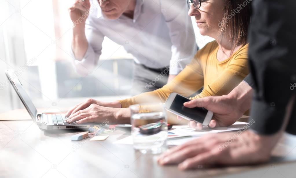 Business people working together, light rays effect