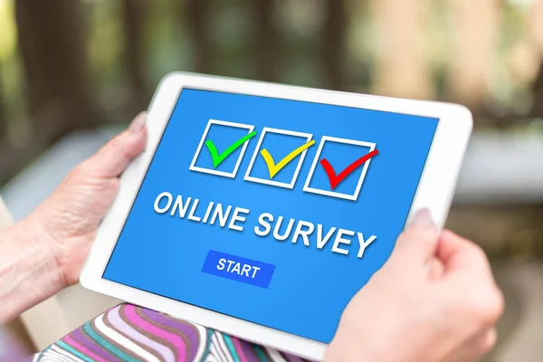 Online survey concept on a tablet