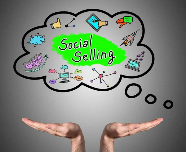 Social selling concept sustained by open hands