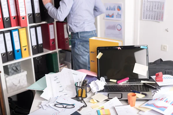 Messy and cluttered desk — Stock Photo, Image