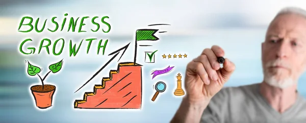 Man drawing business growth concept — Stock Photo, Image
