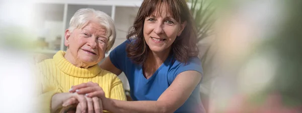 Portrait of happy grandmother with her daughter — Stock Photo, Image