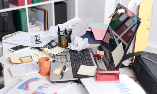 Messy and cluttered desk — Stock Photo, Image