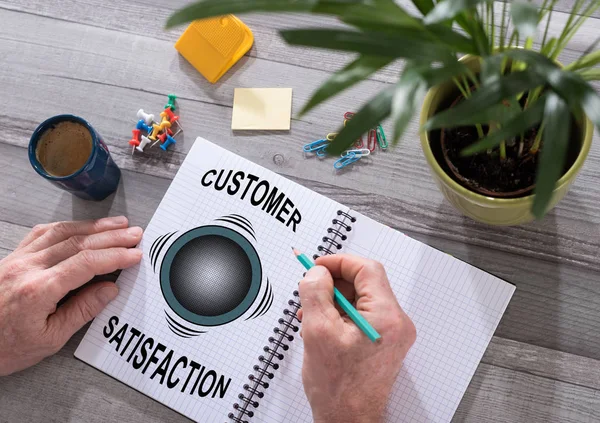 Customer satisfaction concept on a notepad — Stock Photo, Image