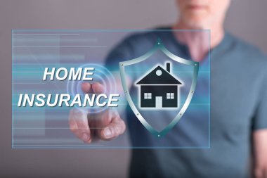 Adam bir dokunmatik ekran üzerinde bir ev sigorta kavramı dokunmadan