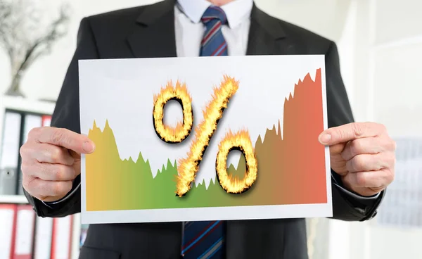 Conceito de taxas de juro apresentado por um empresário — Fotografia de Stock