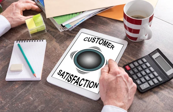 Customer satisfaction concept on a tablet — Stock Photo, Image