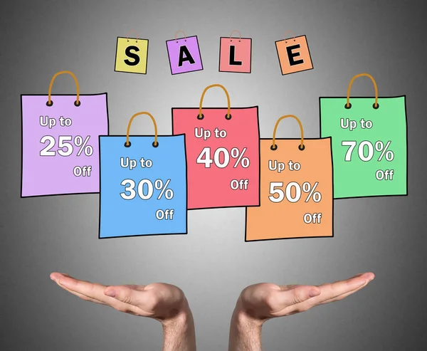 Sale concept sustained by open hands — Stock Photo, Image