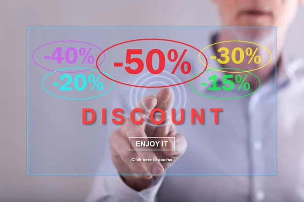 Man touching a discount concept on a touch screen