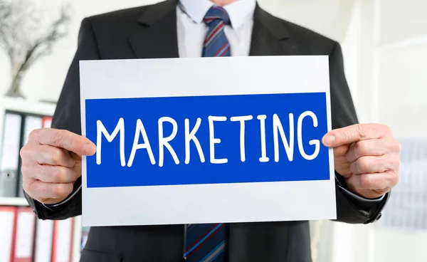 Marketing concept shown by a businessman — Stock Photo, Image