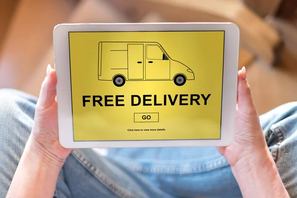 Concepto de entrega gratuita en una tableta — Foto de Stock