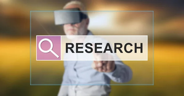 Man wearing a reality virtual headset touching a research concep — Stock Photo, Image