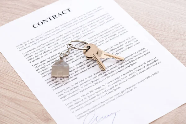 House keys on a contract