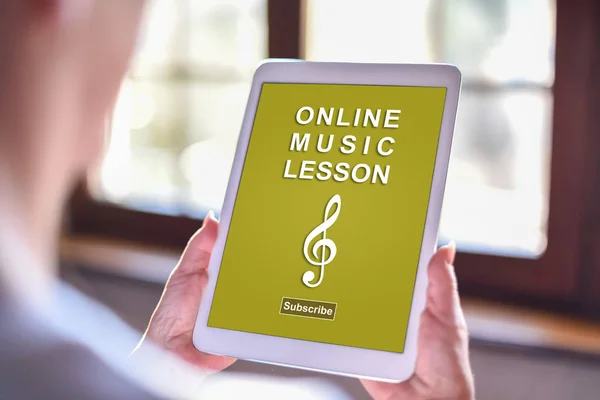 Online music lesson concept on a tablet