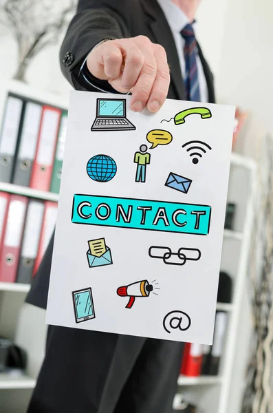 Contact concept shown by a businessman — Stock Photo, Image