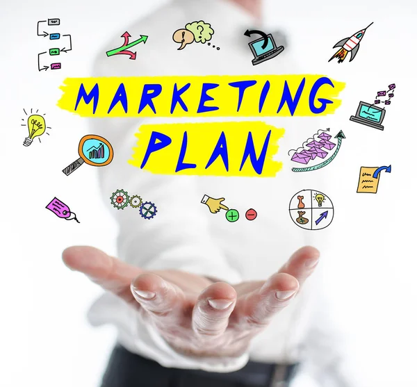 Concepto de plan de marketing que levita por encima de una mano — Foto de Stock