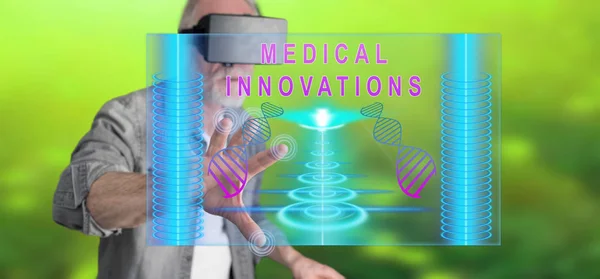 Man wearing a reality virtual headset touching a medical innovat