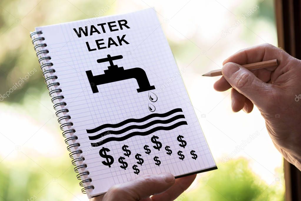 Water leak concept on a notepad