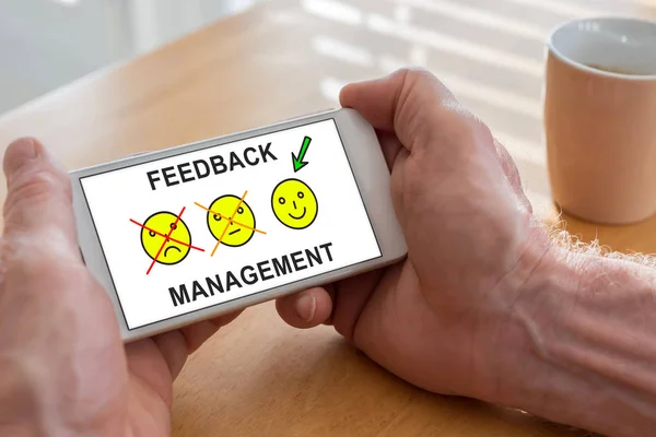 Feedback management concept on a smartphone — Stock Photo, Image