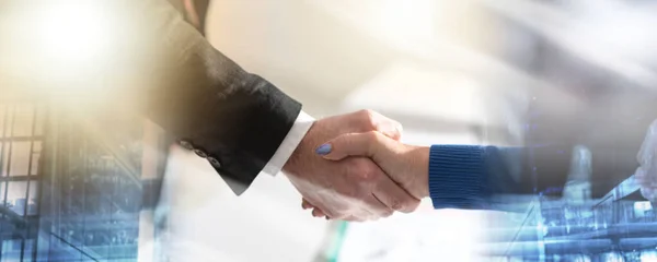 Business agreement with handshake, light effect; multiple exposu — Stock Photo, Image