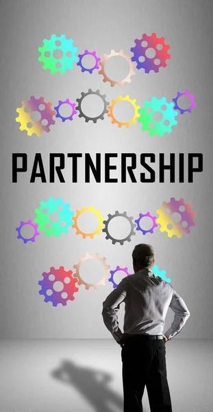 Концепция партнерства под наблюдением бизнесмена — стоковое фото