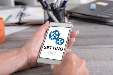 Ayar kavramı bir smartphone cep telefonu ile