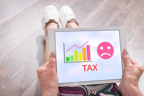 Woman Sitting Floor Tablet Showing Tax Increase Concept — Stock Photo, Image