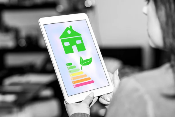 Tablet screen displaying a home energy efficiency concept