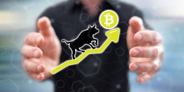 Arka planda bir adamın elleri arasındaki Bitcoin kabadayılığı eğilimi
