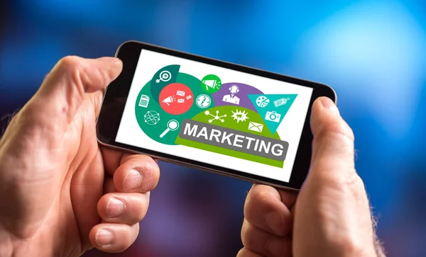 Mano Sosteniendo Smartphone Con Concepto Marketing — Foto de Stock