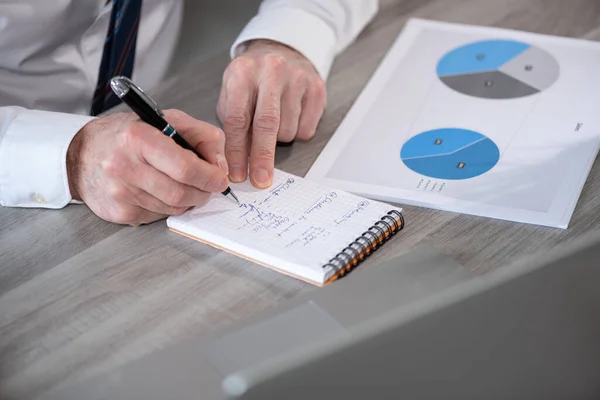 Businessman Analysing Marketing Data Taking Notes — Stock Photo, Image