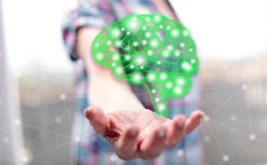 Yapay zeka kavramı arka plandaki bir kadının elinin üstünde.