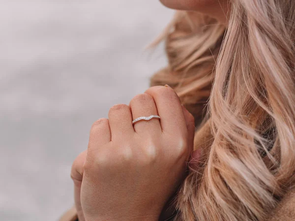 Delicate women\'s ring made of silver with diamonds