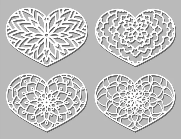 Set of Vector Stencil lacy hearts with carved openwork pattern. — Stock Vector