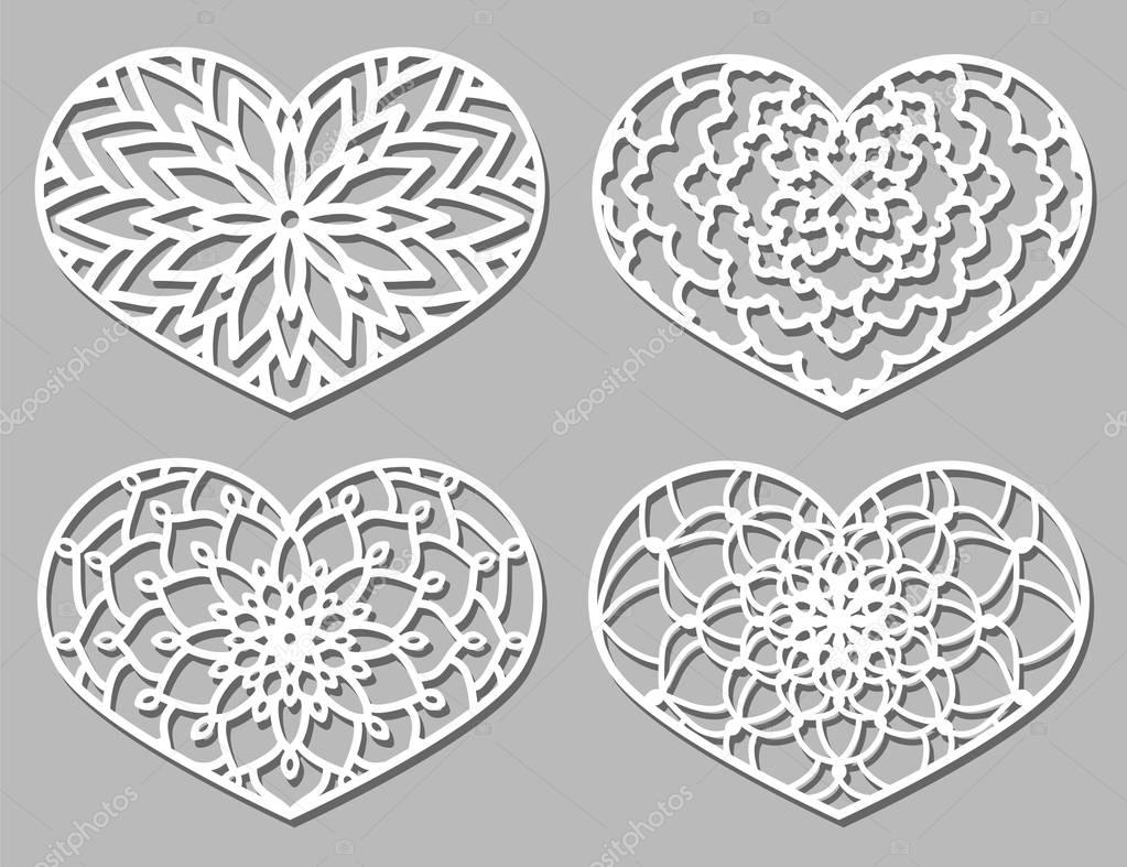 Set of Vector Stencil lacy hearts with carved openwork pattern. 