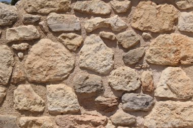 Yunanistan 'ın Girit Adası' ndaki Heraklion 'daki Knossos arkeolojik sahasında taş duvar arkası. 