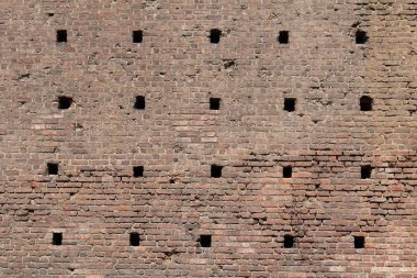 Sforzesco Kalesi 'nin Milan, Lombardy, İtalya' daki tuğlalardan yapılmış duvarlarının bir kısmı. Şato 15. yüzyılda Milan Dükü Francesco Sforza tarafından inşa edilmiştir..