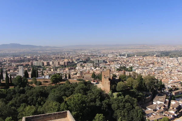 Aerial view of the Albaicin city taken from Watch Tower (Torre de la Vela) of the historical Alhambra Palace complex in Granada, Andalusia, Spain.