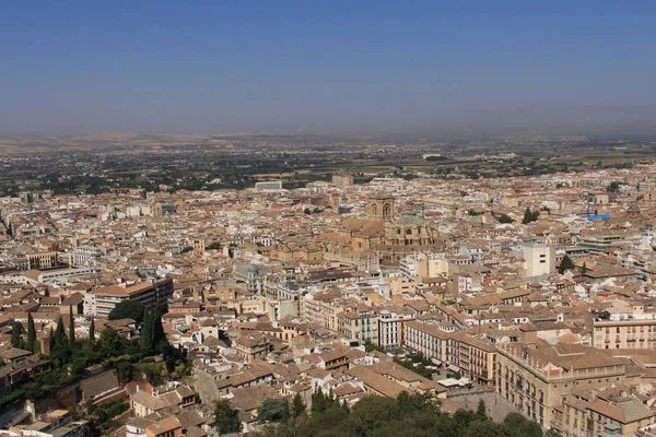 Aerial view of the Albaicin city taken from Watch Tower (Torre de la Vela) of the historical Alhambra Palace complex in Granada, Andalusia, Spain.