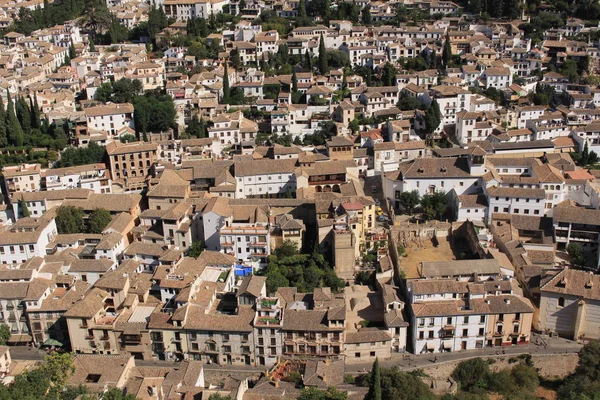 Aerial view of the Albaicin city taken from Watch Tower (Torre de la Vela) of the historical Alhambra Palace complex in Granada, Andalusia, Spain.