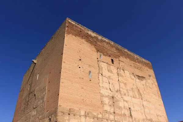 Watch and arms towers of Alcazaba fortress at the historical Alhambra Palace complex in Granada, Andalusia, Spain.