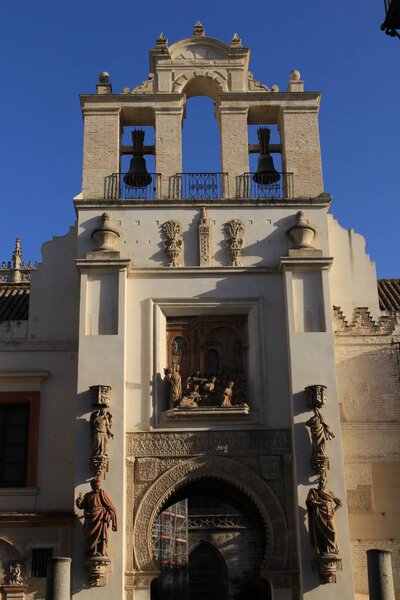 Door of Forgiveness (Puerta del Perdon) of Seville Cathedral (Catedral de Santa Mara de la Sede) with statues in Seville, Andalusia, Spain.