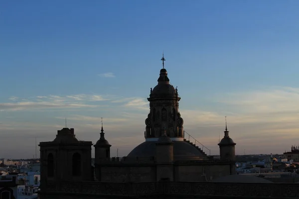 Seville city view at sundown from top of the Metropol Parasol (Setas de Sevilla) building.